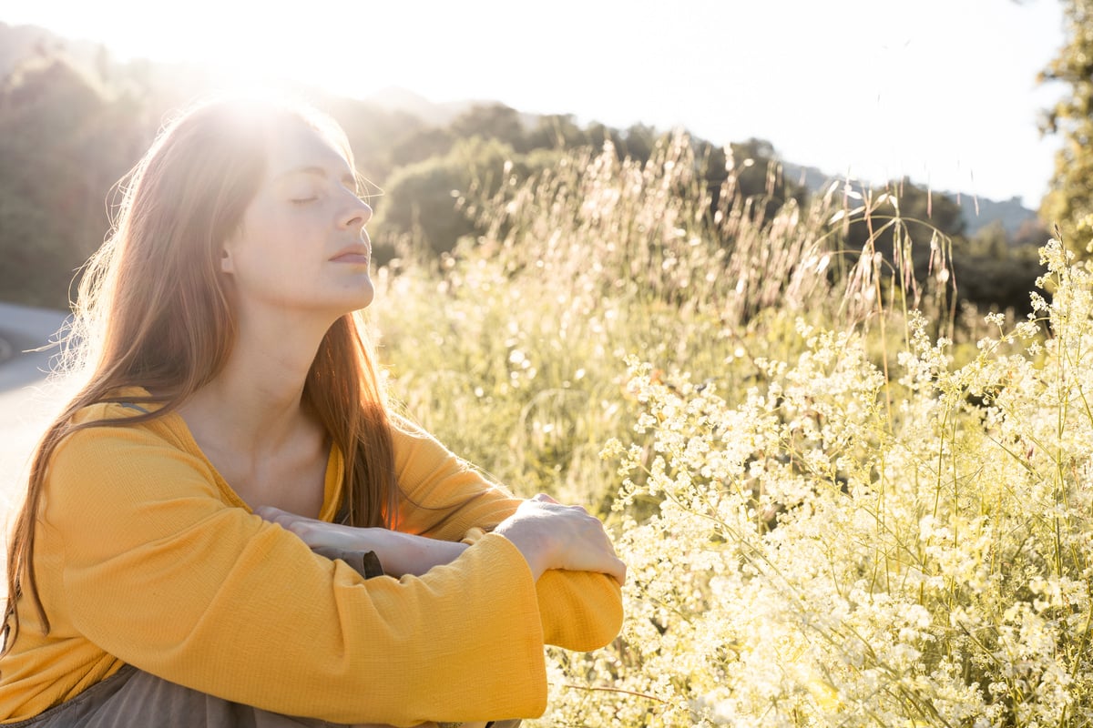 woman in nature sunspots